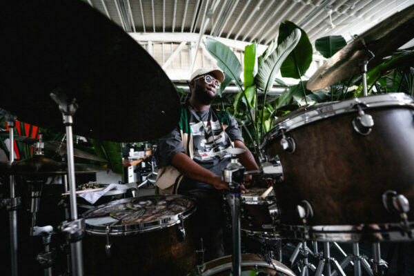 Heidi Duckler Dance NW 2026 Come As You Are Festival presented by Heidi Duckler Dance NW. Dancers Charles Roy and Daniel Girón with composer/percussionist Machado Mijiga, performing a prologue to a new site specific work inspired by John Steinbeck’s Grapes of Wrath. March 14, 2026. Photo by Jason Quigley.